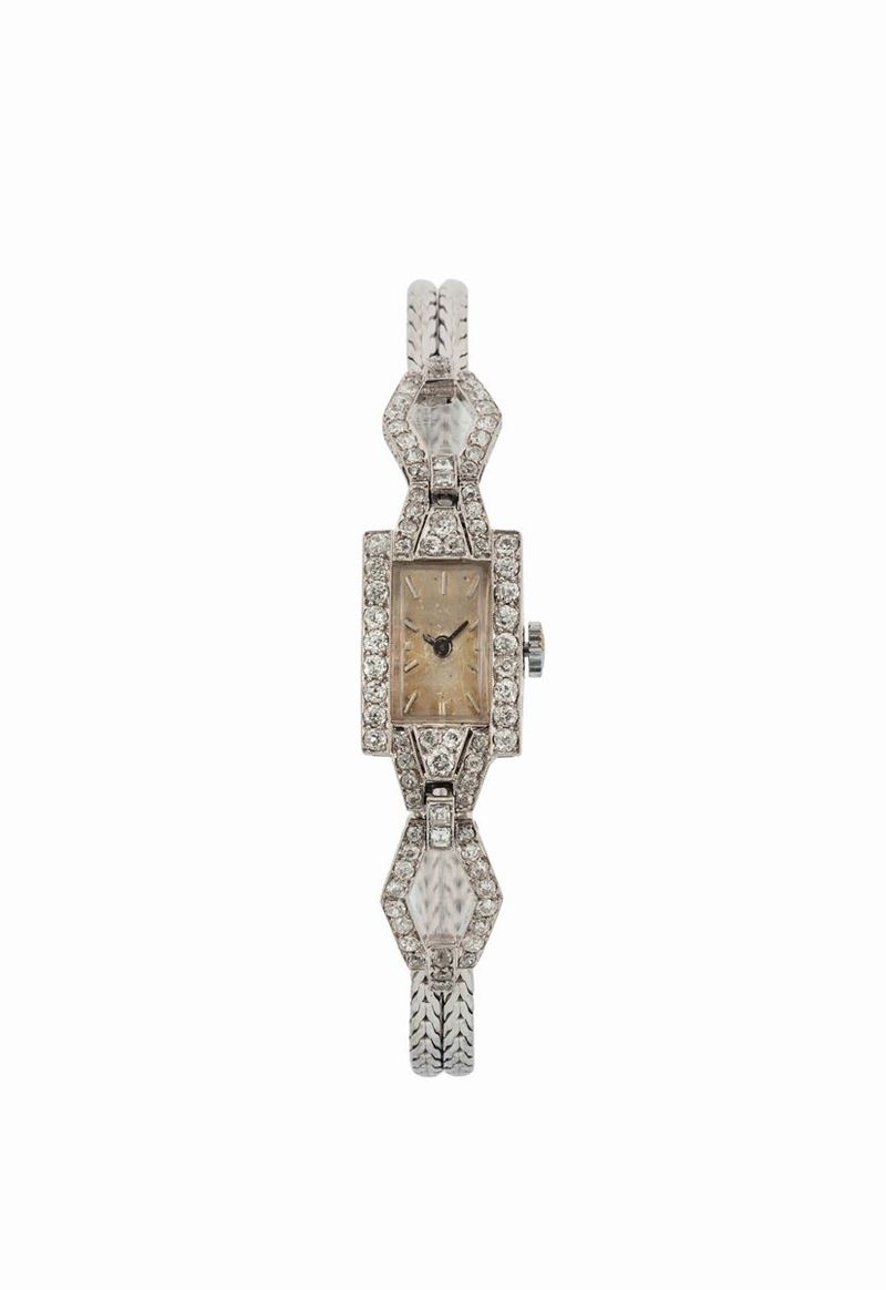 UNIVERSAL GENEVE, orologio da ploso, in oro bianco 18K con bracciale integrato in oro. Realizzato nel 1930 circa  - Asta Orologi da Polso e da Tasca - Cambi Casa d'Aste