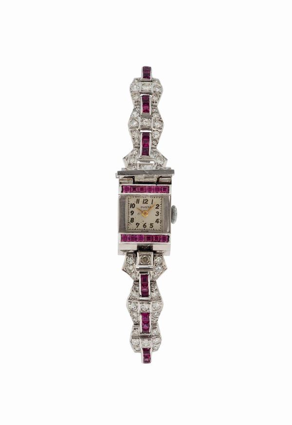 JUSTA, platinum and ruby lady's wristwatch with integrated 18K white gold bracelet. Made circa 1920