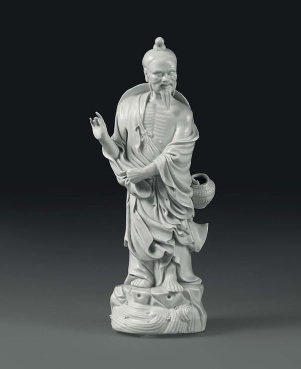 A fisherman in Blanc de Chine porcelain, China, 20th century