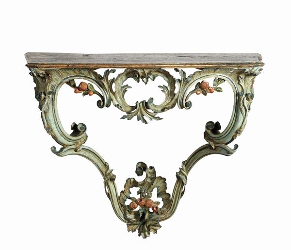 A Louis XV console table in carved and lacquered wood, 18th century