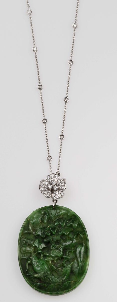 Carved jade and diamond pendant