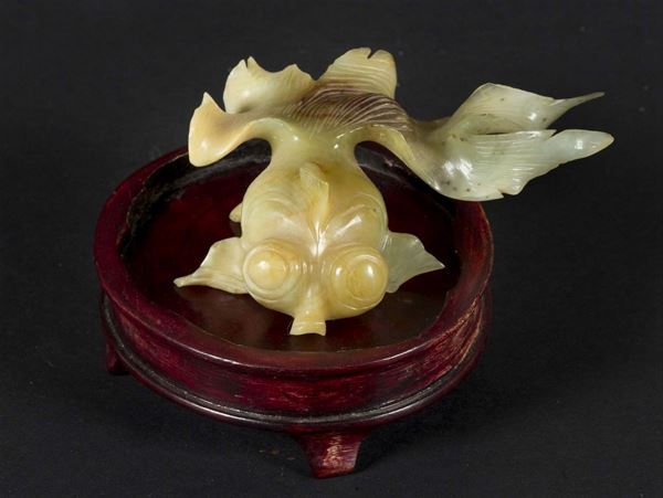 A russet and jade figure of a fish, China, 20th century