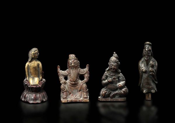 Four small bronze figures of dignitaries, Tibet, 17h/18th century