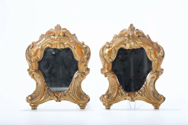 Coppia di specchiere in legno intagliato e dorato, XVIII-XIX secolo