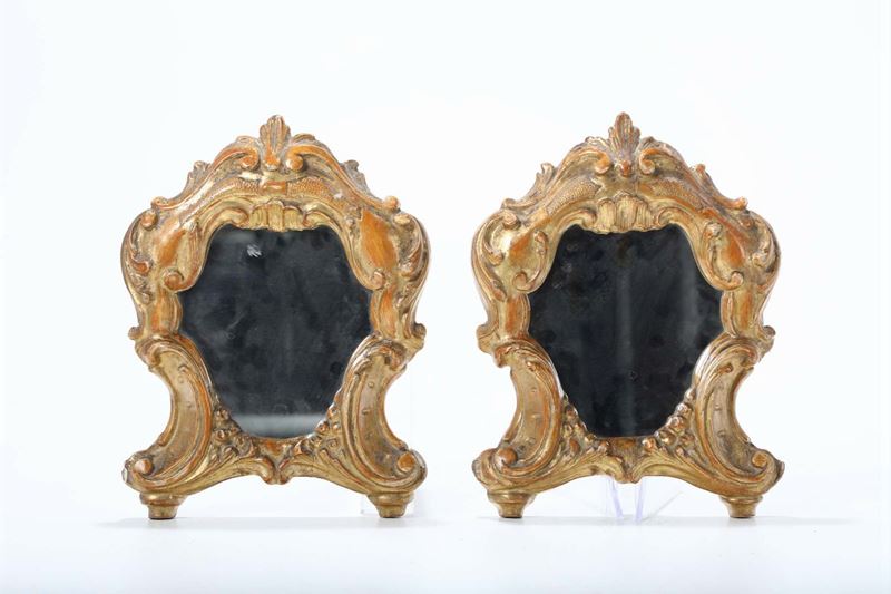 Coppia di specchiere in legno intagliato e dorato, XVIII-XIX secolo  - Auction Sculture Timed Auction - Cambi Casa d'Aste