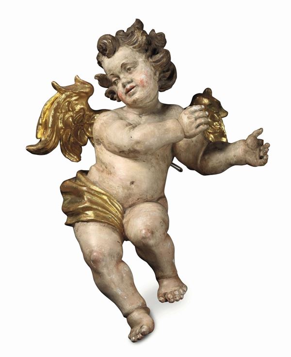 Putto in legno policromo e dorato. Arte barocca Germania del sud o Austria XVII secolo.