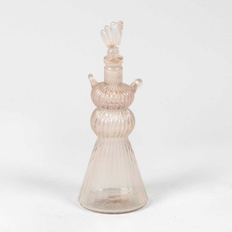 Fulvio Bianconi, Venini, Murano, 1948 ca. A rare perfume bottle, Quattro Stagioni series, anthropomorphic shape in ribbed blown glass with an iridised surface.  - Auction Murano '900 - II - Cambi Casa d'Aste
