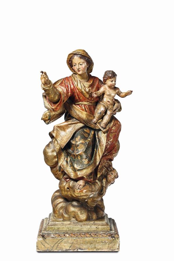 Madonna del Rosario, in legno dorato, argentato e policromato. Anton Maria Maragliano e bottega (attribuito a), Genova inizi del XVIII secolo.