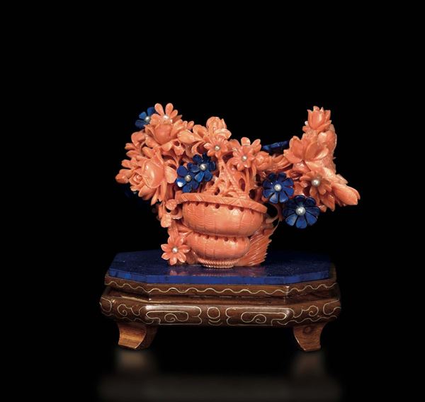 A small carved coral and lapis lazuli vase with flower, China, early 20th century