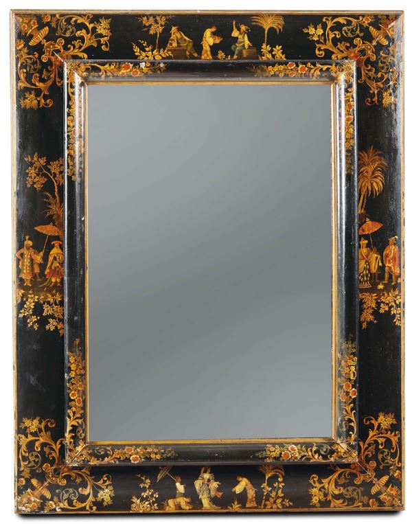A wooden mirror, lacquered with a black background and decorated with polychrome figures, in Chinese  [..]