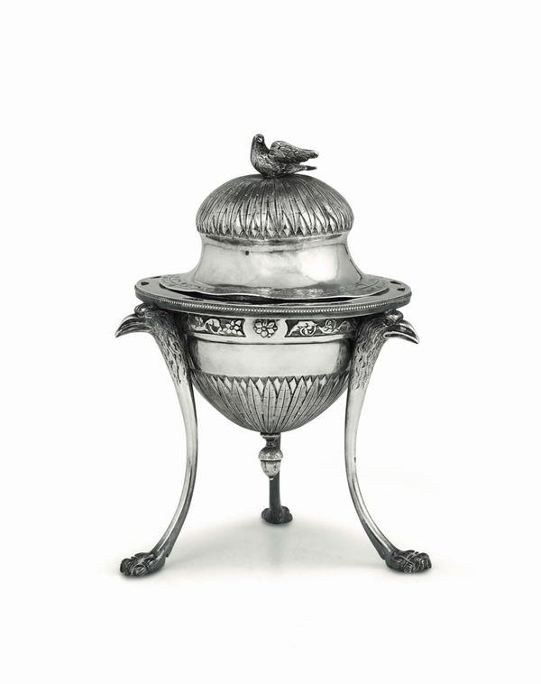 A three-legged sugar bowl in molten, embossed and chiselled silver, Genoa, Torretta stamp for the year 1824.