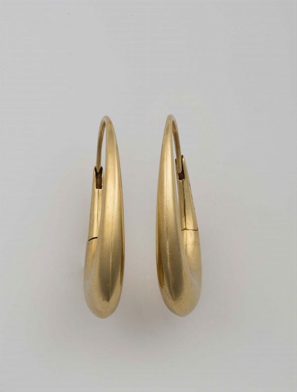 Pair of gold earrings. Pomellato