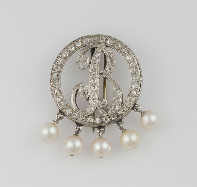 Spilla “B” con perline e rosette di diamante  - Asta Vintage, Gioielli e Orologi - Cambi Casa d'Aste