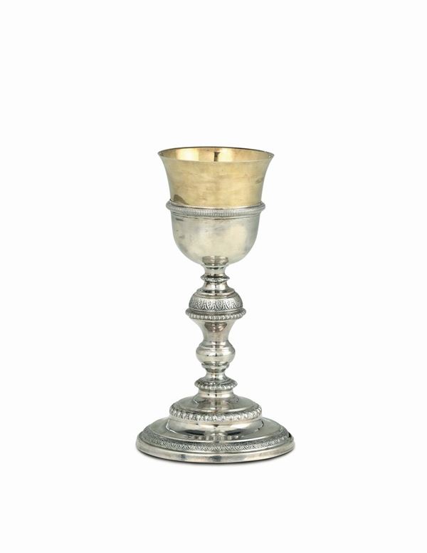 A goblet in silver and gilded silver, molten, embossed, and chiselled, Italy, (Turin?), 19th century, title mark and stamp for silversmith Carlo Balbino (...1798 - 1824...).