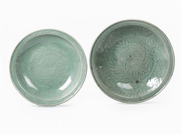 Two Celadon porcelain dishes with naturalistic decoration, China, Ming Dynasty, 17th century