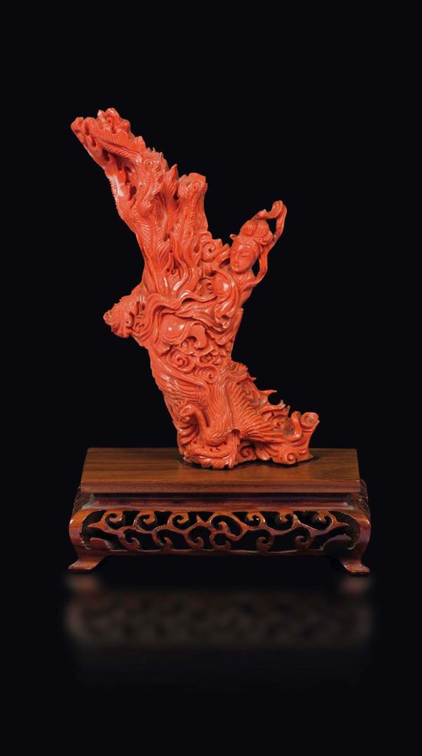 A carved coral group with Guanyin and phoenix, China, early 20th century