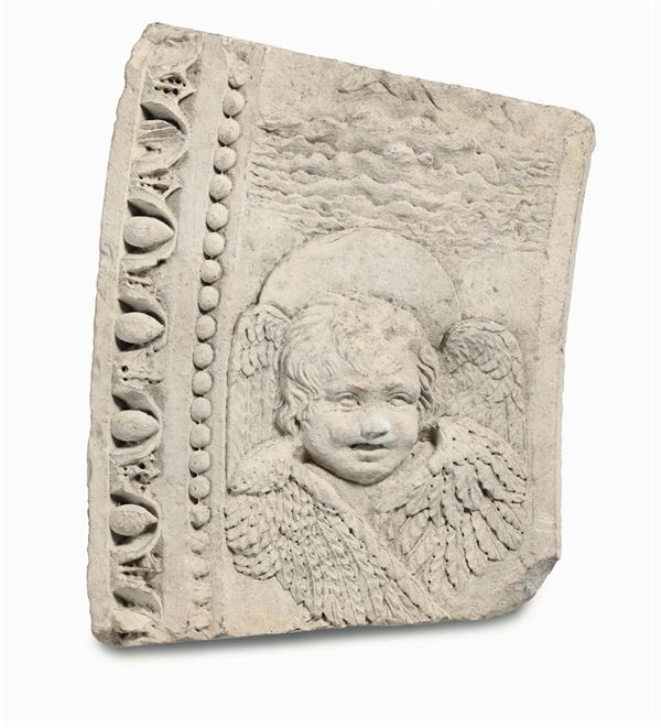 An architectonic fragment in limestone, sculpted in bas-relief. Italian Renaissance art from the 15th century
