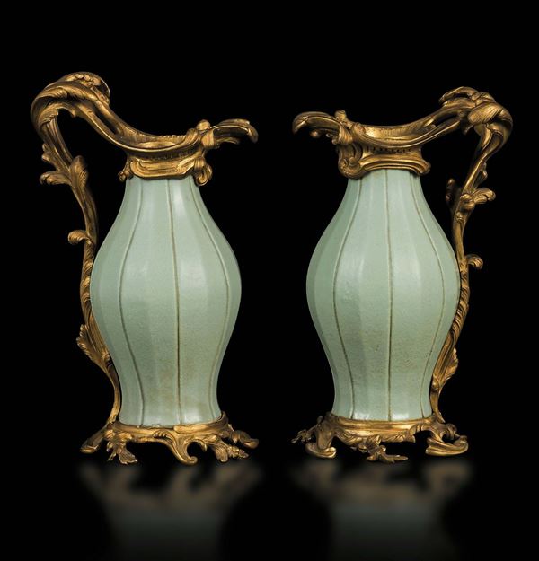 A pair of Celadon porcelain grooved vases with gilt bronze details, China, Qing Dynasty, 18th century