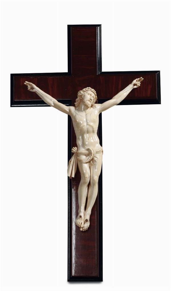 A living Christ in carved ivory. Cristo vivo in avorio scolpito. Cross in purple ebony and ebanised wood. German Baroque sculptor from the 17th century