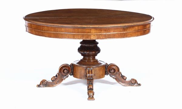 Tavolo rotondo da pranzo Luigi Filippo allungabile, in  noce con gamba centrale intagliata, XIX secol [..]