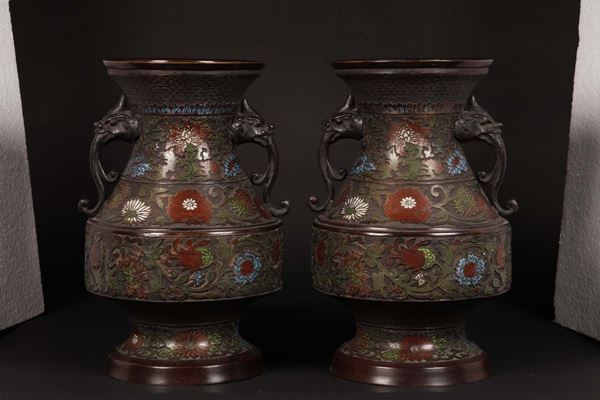 A pair of enamelled bronze vases with flowers, Japan, 19th century
