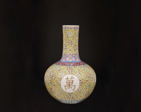 A yellow-ground porcelain vase with inscription within reserves, China, 20th century