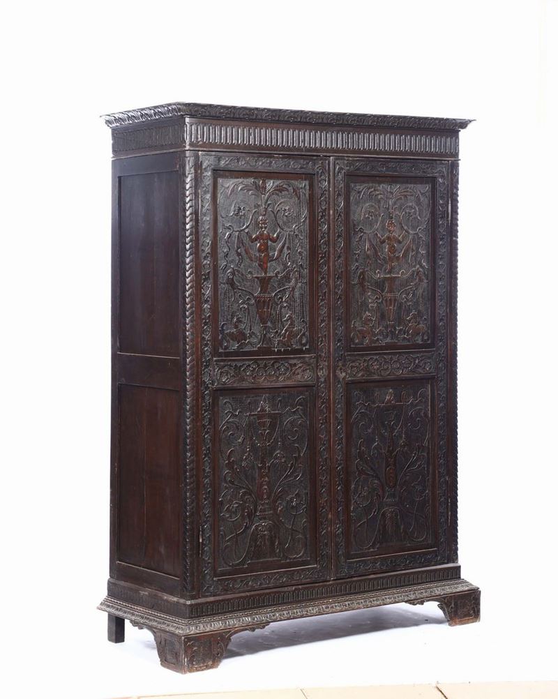 Armadio a due ante intagliate a motivi fitoformi, XVIII-XIX secolo  - Auction Timed Fine Art - I - Cambi Casa d'Aste