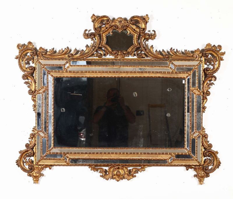 Specchiera in legno intagliato e dorato, XIX secolo  - Asta Antiquariato - Cambi Casa d'Aste