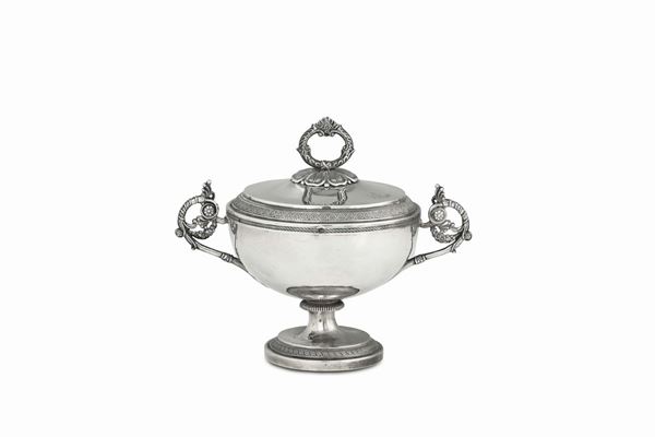 A small soup bowl in molten, embossed and chiselled silver, with lid. Rome, first quarter of the 19th century. Roman cameral stamp, mark for silversmith Antonio Cappelletti (1804 – 1838) and recognition stamps.