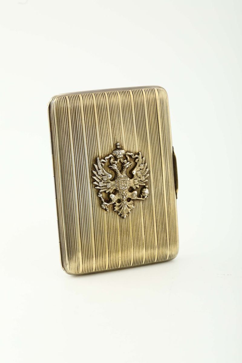 A cigarette case in vermeil silver, molten, embossed and engraved. Moscow, title stamps in use from 1906 to 1917  - Auction Collectors' Silvers - Cambi Casa d'Aste