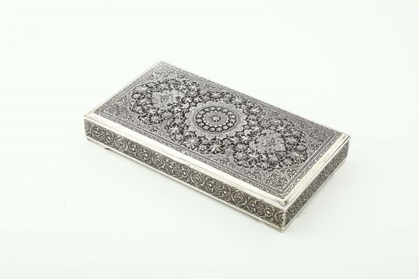 A box in molten, embossed and chiselled silver, Middle East (Persia?), 19th-20th century