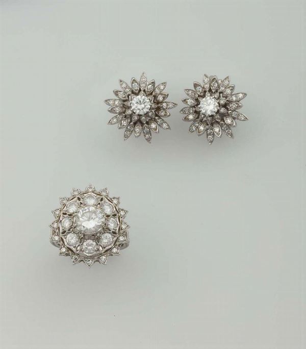 Mario Buccellati. Parure composta da anello ed orecchini con diamanti taglio brillante