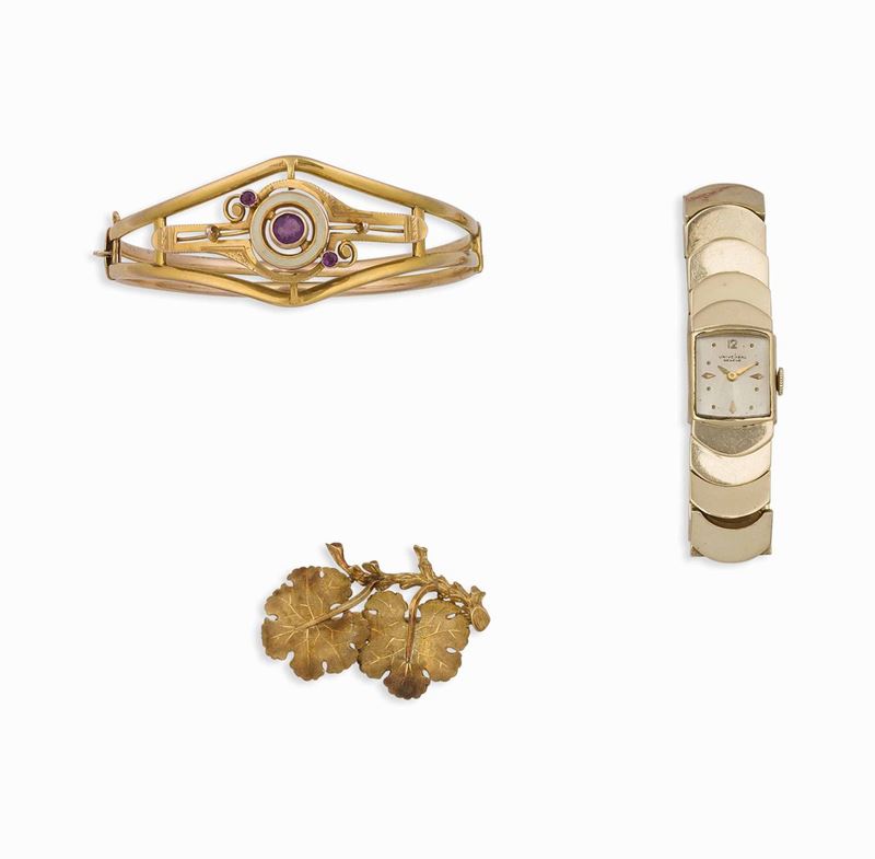 Lotto composto da una spilla firmata F. Buccellati, un bangle con ametista e smalto ed un orologio Universal  - Asta Vintage, Gioielli e Bijoux - Cambi Casa d'Aste