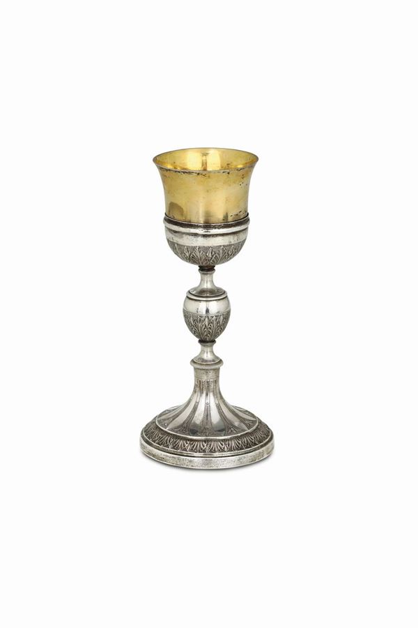 A goblet in silver and gilded silver, molten and chiselled. Italian manufacture from the 19th century.