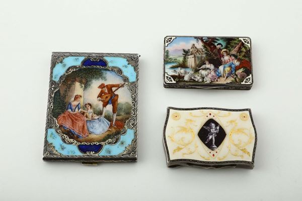 A group of three boxes in molten, embossed and chiselled silver and polychrome enamel