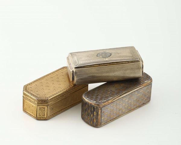 Three tobacco boxes in vermeil silver, embossed and chiselled