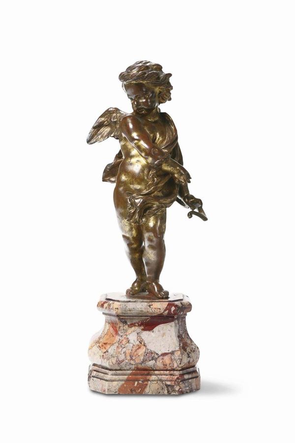 Cupido in bronzo fuso, cesellato e dorato. Scultore barocco attivo nel XVII secolo prossimo a Francois Duquesnoy (1597-1643)