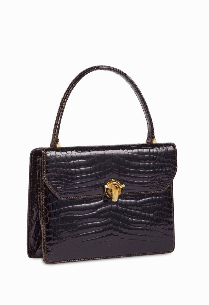 Gucci Borsa a mano in coccodrillo marrone anni '60/ '70  - Auction Vintage, Jewels and Bijoux - Cambi Casa d'Aste