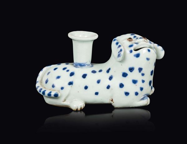 A blue and white porcelain dog candlestick, China, Qing Dynasty, 18th century