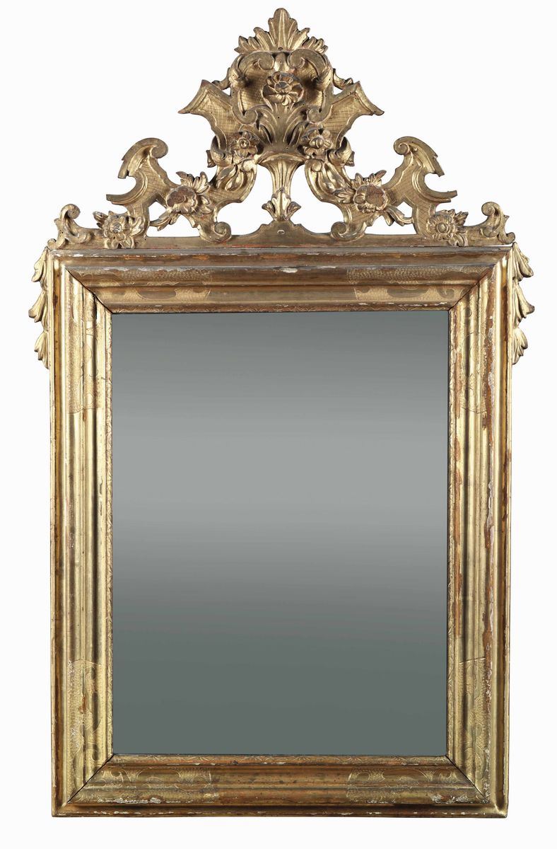 Specchiera Luigi XIV in legno intagliato e dorato, XVIII secolo  - Asta Arredi - Cambi Casa d'Aste