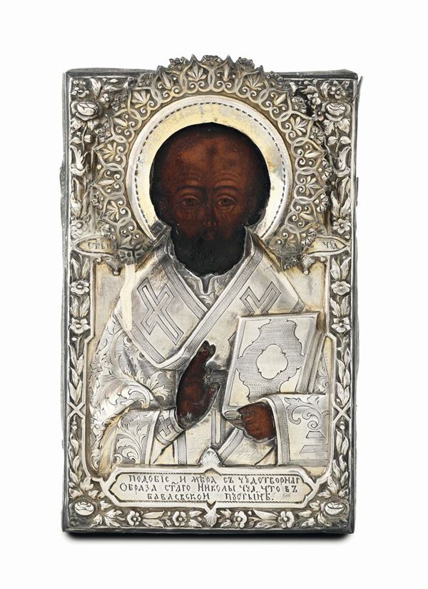 Icona raffigurante San Nicola con riza in argento sbalzato e cesellato, Russia (Tallin?) 1874