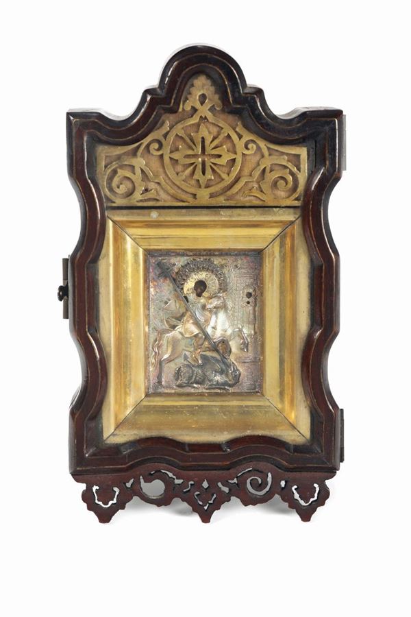A wooden icon depicting Saint George and the dragon, with a plate in embossed, perforated, chiselled and gilded silver, Moscow 1884