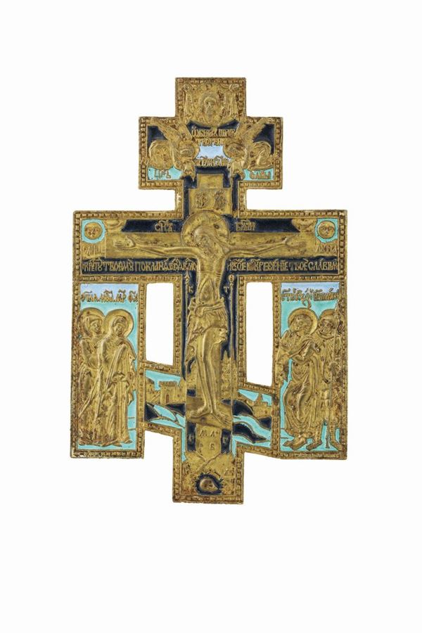 A crucifixion in molten, chiselled and gilded bronze and polychrome enamel, Russian art from the 18th-19th century.
