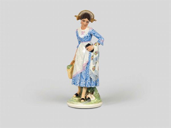 Abele Jacopo, Lenci, Turin, 1950 ca. A figure of a woman in a regional costume from Lombardy, earthenware ceramics with a polychrome decor