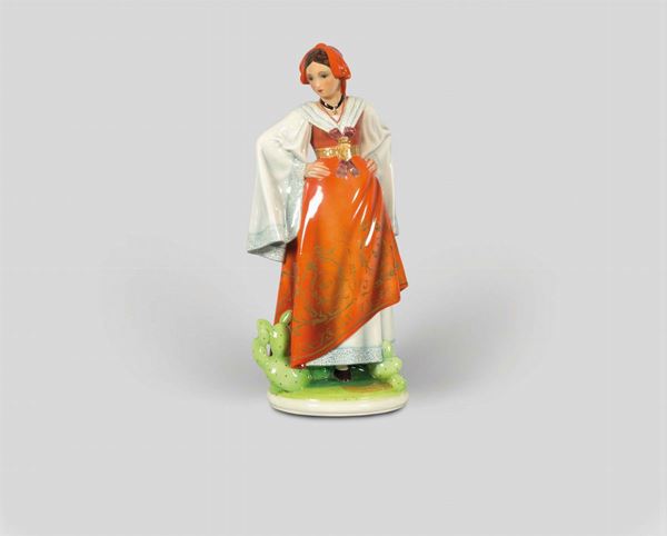 Abele Jacopi, Lenci, Turin, 1950 ca. A figure of a woman in a regional costume from Sicily, earthenware ceramics with a polychrome and gilded decor