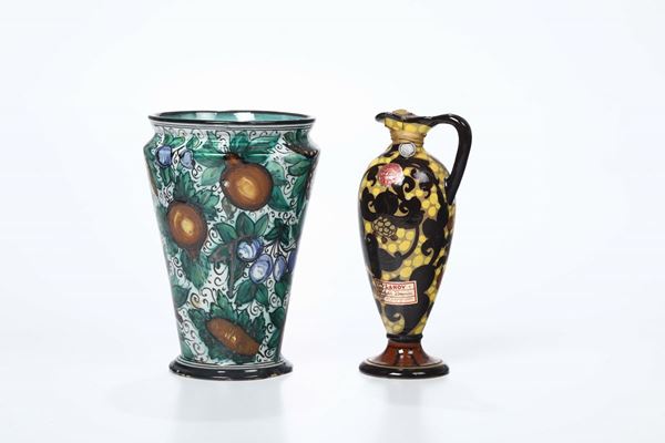 Due vasi in ceramica decoro in policromia a motivo di fantasia vegetale, uno marcato MAP Pesaro
