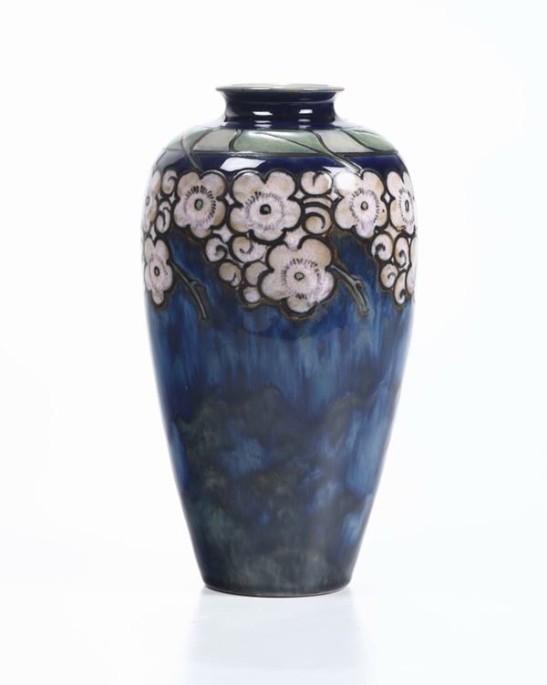 Vaso in ceramica smaltata decoro di motivi floreali incisi su sfondo blu con colature, marcato, anni 20/30