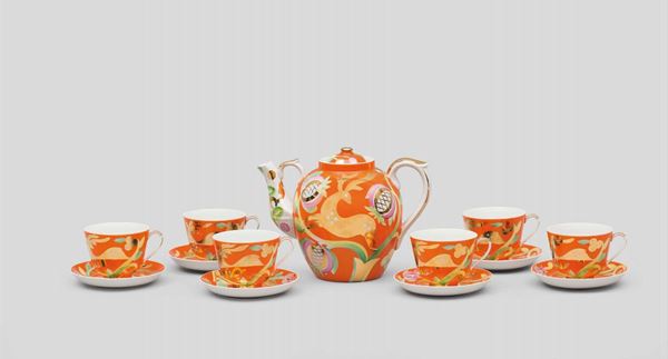Russia, 19th century. A tea set made up by six cups and a large teapot, porcelain with a stylised decor and gilding