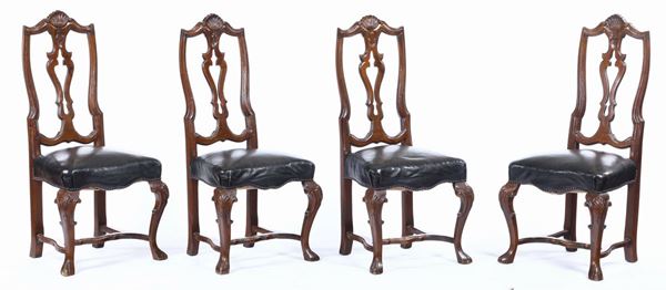 Quattro sedie in legno intagliato, XX secolo