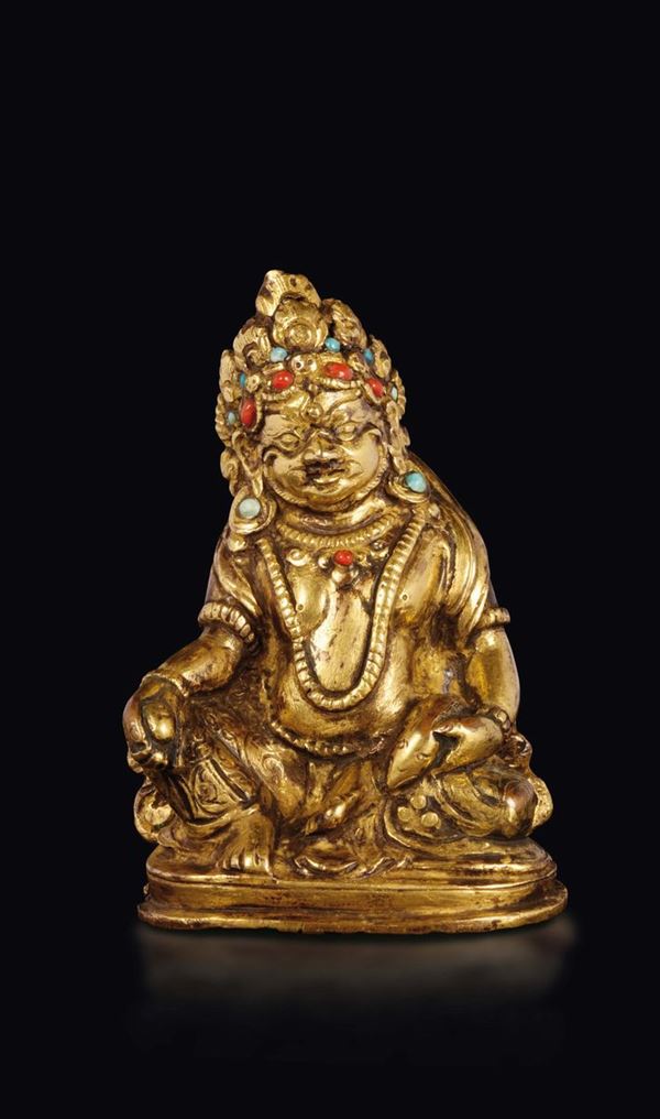 Figura di Sita-Jambala in bronzo dorato con innesti in turchese e corallo, Tibet, XVI secolo